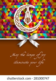 Greeting Card of Ramadan Kareem Alekum Mubarakun with intricate Arabic calligraphy and lamp for the celebration of Muslim community festival.