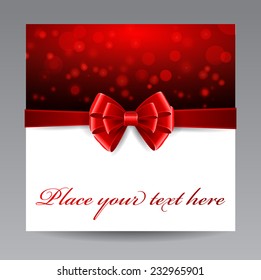 Greeting card with red bow