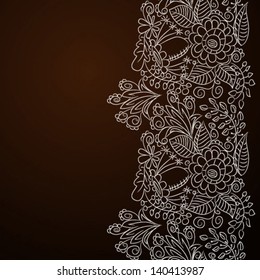 Greeting card with silver floral ornament on brown background