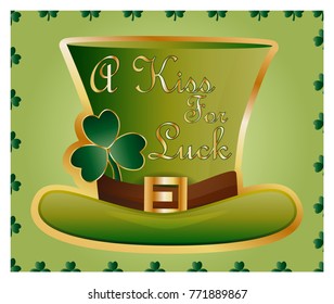 Greeting card of St. Patrick with sparkling green hat and leaves of a clover and an inscription - A Kiss For Luck