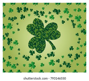 Greeting card of St. Patrick with sparkling green leaves of clover, and with green clover leaf consisting of circles