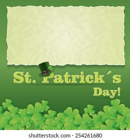 Greeting card with St. Patrick's Day with a piece of crumpled paper and background of shamrocks.