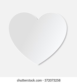 Greeting card for St. Valentine Day with gray-white heart on the light  background. 