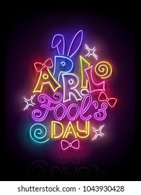 Greeting Card Template for April All Fool's Day. Funny Glow Signboard with Letters, Bows and Swirl. Neon Light Poster, Flyer, Banner, Postcard. Glossy Background. Vector 3d Illustration. Clipping Mask