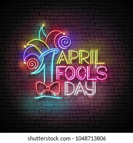 Greeting Card Template for April Fool's Day. Vintage Glow Signboard with Letters and Jester Hat. Neon Light Poster, Flyer, Banner. Seamless Brick Wall. Vector 3d Illustration. Used Clipping Mask