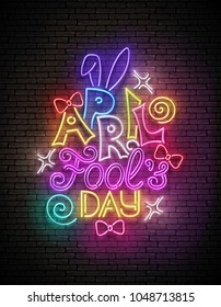 Greeting Card Template for April Fool's Day. Funny Glow Signboard with Letters, Bows and Swirl. Neon Light Poster, Flyer, Banner. Brick Wall, Horisontal Seamless. Vector 3d Illustration. Clipping Mask