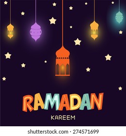 A greeting card template- 'Ramadan Kareem' hanging arabic lamps or lantern.