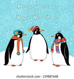 Greeting card with three funny penguins. Background with snowflakes.