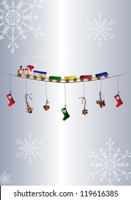 Greeting card with toy train and snowflakes