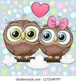 Greeting card with Two cute Cartoon Owls on a branch