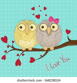 Greeting card with two cute owls in love sitting on branch.