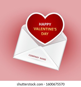 Greeting card for Valentine's day with white envelope and red heart.