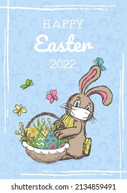 Greeting card vector template of Happy Easter 2022. Easter bunny in a medical mask holds a wicker basket with painted eggs on blue textured background
