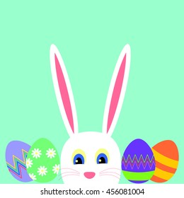 Greeting card with white Easter rabbit and easter eggs on a blue background