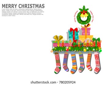 Greeting cards, poster or banner. Christmas decoration in a room interior with wreath, candles, colorful socks, and present boxes.