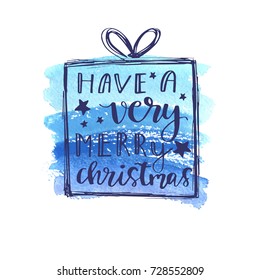 Greeting Christmas card design with hand-drawn typography lettering phrase: Have a very merry Christmas on blue watercolor painted backgrounds. Holiday banner, sticker, or poster design.