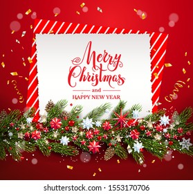 Greeting Christmas card on red background with holiday decorations pine tree branches, stars, snowflakes. Merry Christmas lettering.