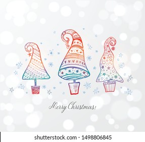 Greeting christmas card with three ornated doodle christmas trees on white glowing background