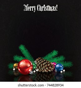 greeting with Christmas decorations and pine cone on black grunge background
