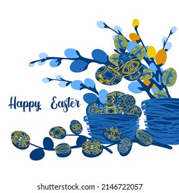 Greeting Easter card with willow branches. Painted eggs with unusual patterns in traditional Ukrainian colors. Happy easter