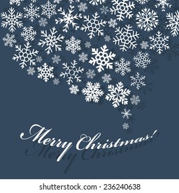 Greeting flat dark grey card with swirl carved from a variety of snowflakes and shadow. Merry Christmas! Happy New Year!