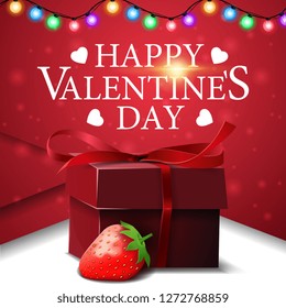 Greeting red card for Valentine's Day with gifts and strawberry