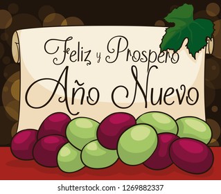 Greeting scroll in a table with delicious grapes according to Colombian and Latin American tradition: twelve grapes to be eaten for a happy and prosperous New Year (written in Spanish).