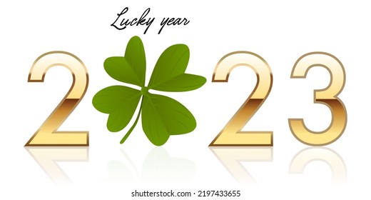 Greetings, with 2023 written in golden numbers around a four leaf clover that symbolizes luck and success.