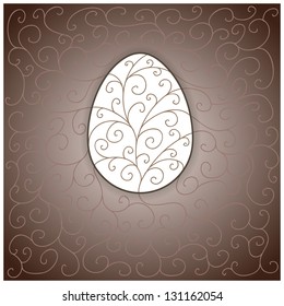 Greetings card with decorated Easter egg. Swirls