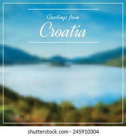 Greetings from Croatia postcard with blurry image from Dalmatia in background