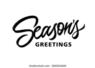 Season’s Greetings ink calligraphy. Brush lettering isolated on white background.