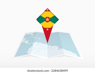 Grenada is depicted on a folded paper map and pinned location marker with flag of Grenada. Folded vector map.