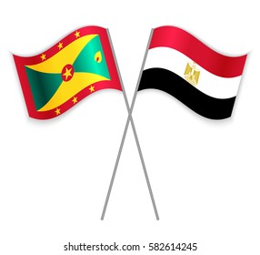 Grenadian and Egyptian crossed flags. Grenada combined with Egypt isolated on white. Language learning, international business or travel concept.