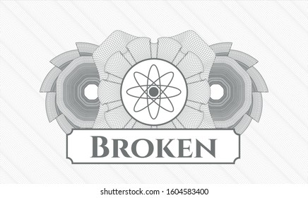 Grey abstract rosette with atom icon and Broken text inside
