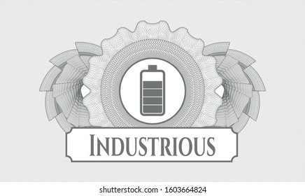 Grey abstract rosette with battery icon and Industrious text inside