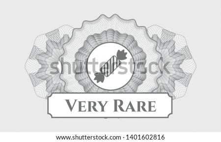 Grey abstract rosette with candy icon and Very Rare text inside