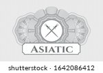 Grey abstract rosette with crossed swords icon and Asiatic text inside