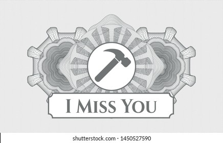 Grey abstract rosette with hammer icon and I Miss You text inside