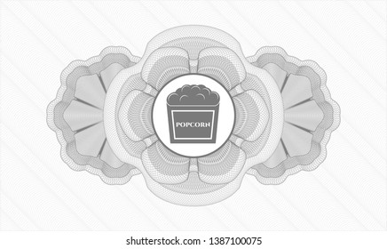 Grey abstract rosette with popcorn icon inside