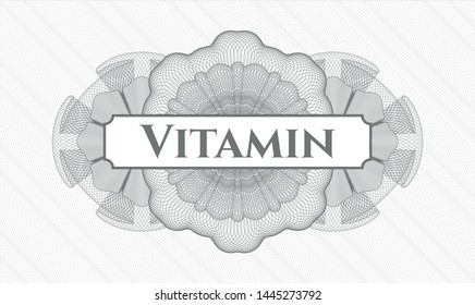 Grey abstract rosette with text Vitamin inside