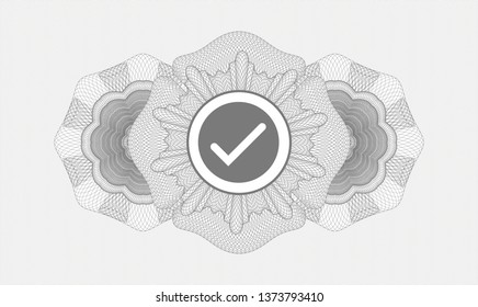 Grey abstract rosette with tick icon inside
