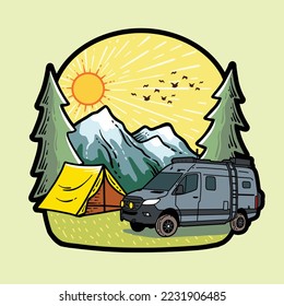 grey adventure camper van with roof rack and equipment, all terrain tires on a camping area with yellow tent and mountains behind it with lush fir trees