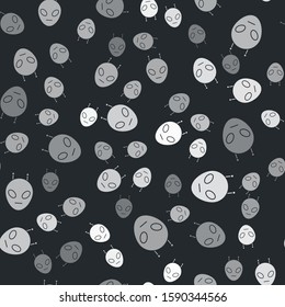 Grey Alien icon isolated seamless pattern on black background. Extraterrestrial alien face or head symbol.  Vector Illustration