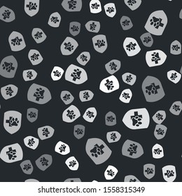 Grey Animal health insurance icon isolated seamless pattern on black background. Pet protection icon. Dog or cat paw print.  Vector Illustration