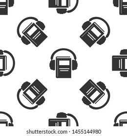 Grey Audio book icon isolated seamless pattern on white background. Book with headphones. Audio guide sign. Online learning concept.  Vector Illustration