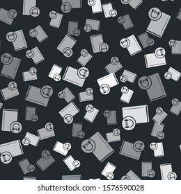 Grey Audio book icon isolated seamless pattern on black background. Book with headphones. Audio guide sign. Online learning concept.  Vector Illustration
