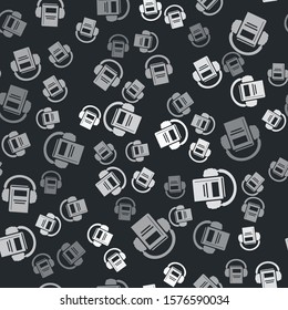 Grey Audio book icon isolated seamless pattern on black background. Book with headphones. Audio guide sign. Online learning concept.  Vector Illustration