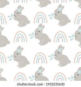 Grey Baby Bunny holds leaves in its paws and rainbows seamless pattern. Little Rabbit. Cute Easter Animal. Hares Vector Kids Illustration.Perfect for textile prints, kids design, decor, wrapping.