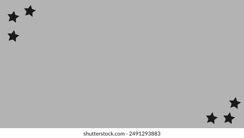 grey background with black stars in the corners