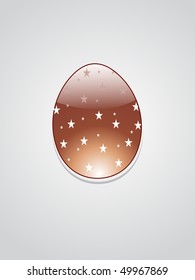 grey background with isolated chocolate easter egg